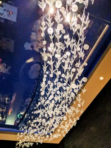 Glass fish chandelier at Flying Fish Disney