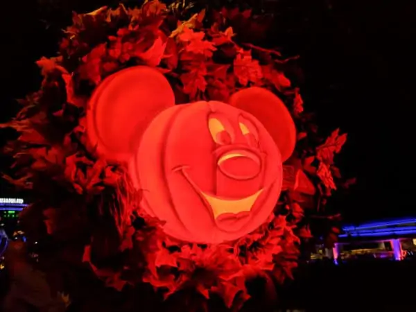 Mickey pumpkin glowing at night in Magic Kingdom