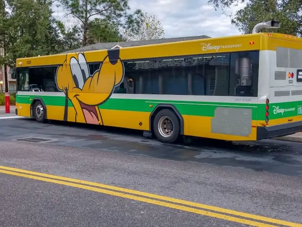 Disney bus with picture of Pluto on the outside