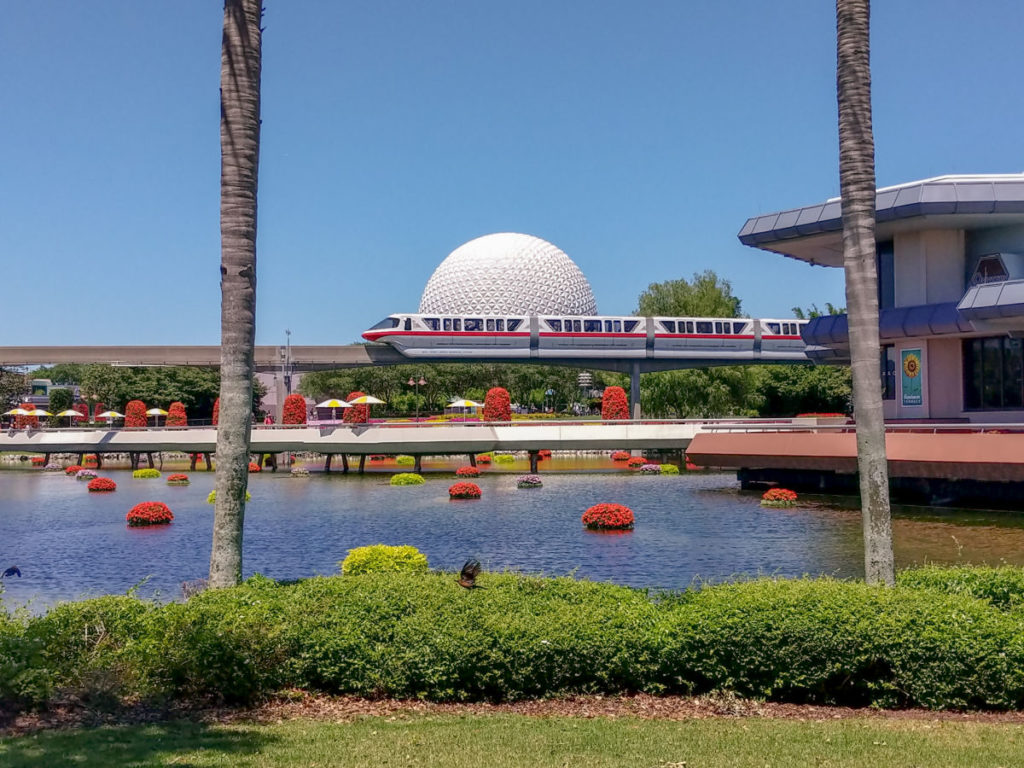 Spaceship Earth at Epcot with a monorail in front of it
