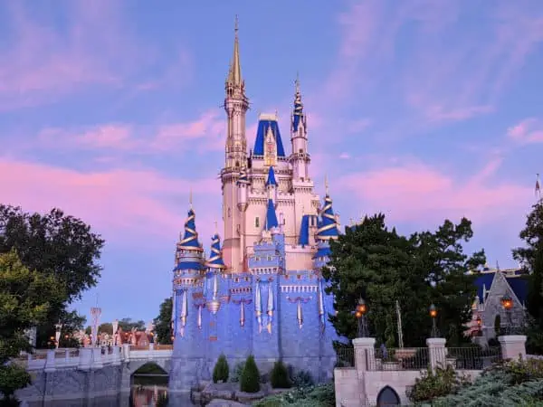 Cinderella's Castle at dawn with pink and blue skies