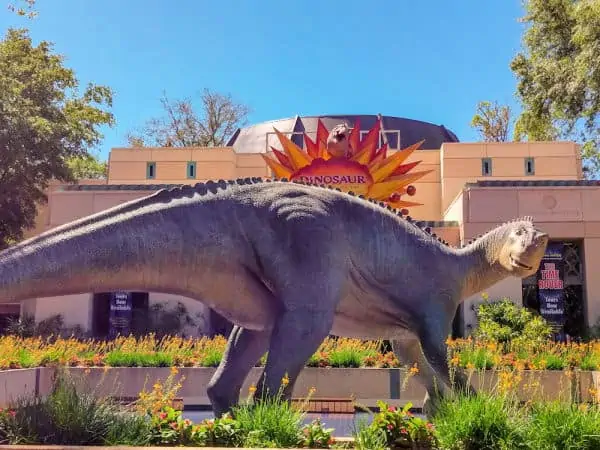 Dinosaur in front entrance of DINOSAUR ride at Animal Kingdom