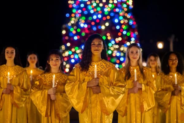 Choir singers at Epcot's Candlelight Procession, image copyright by Disney