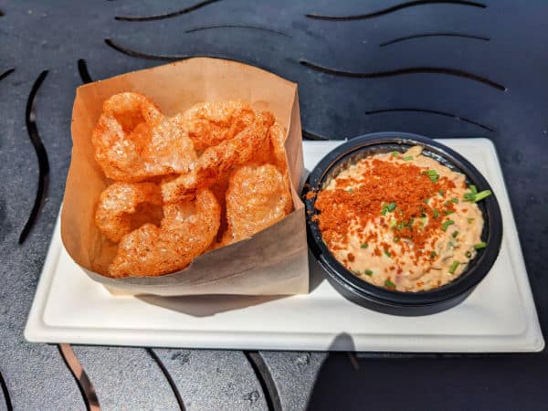 Crispy BBQ pork rinds with pimento cheese dip at The Swanky Sauce-y Swine booth