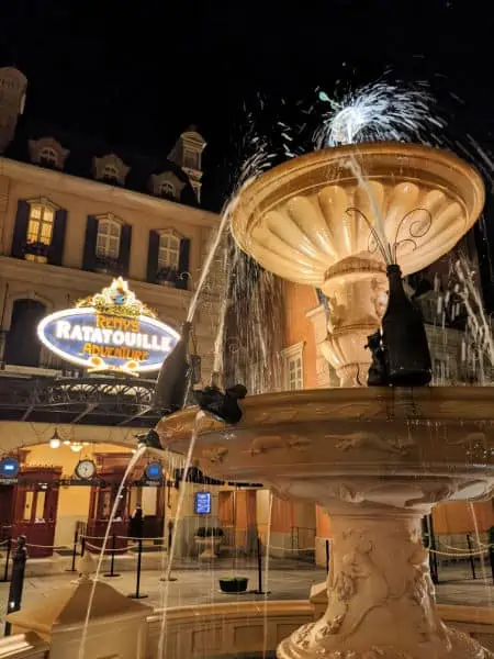 Exterior of Remy's Ratatouille Adventure at night