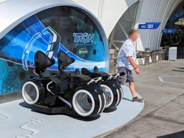 Sample ride vehicles outside of Tron Lightcycle Run