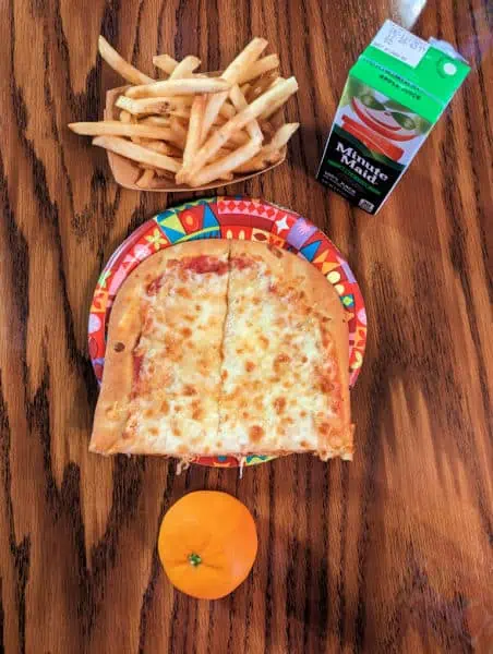 Gourmet Cheese Flatbread kids' meal at Pinocchio Village Haus. Includes fries, a manadarin orange, and a juice box